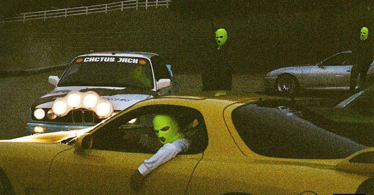 masked men in sport cars