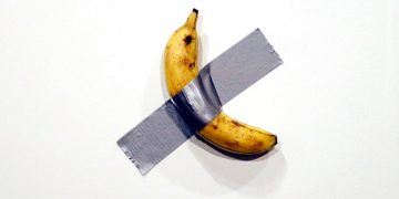 a banana taped to the wall at art basel