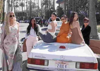 kuwtk - a group of white women sitting on a car