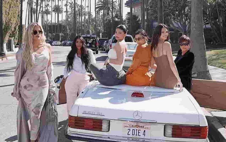 kuwtk - a group of white women sitting on a car