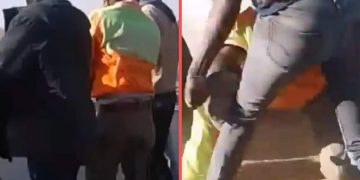 people fighting a mogale city officer