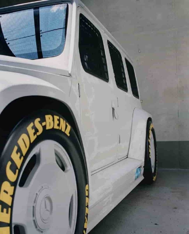 virgil abloh g-class - side-view of a white SUV