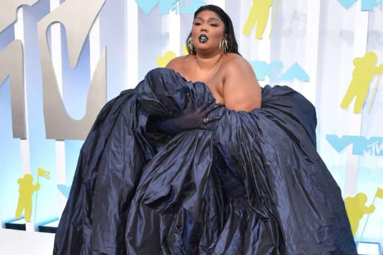 lizzo Adele flute sexual harassment body shaming lawsuit dancers