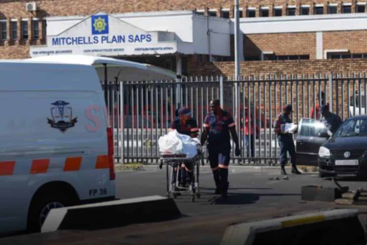 body of hard livings thug Chucky being taken by forensics